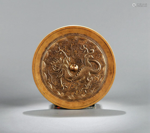 A CHINESE DRAGON BRONZE MIRROR, 18TH CEN…