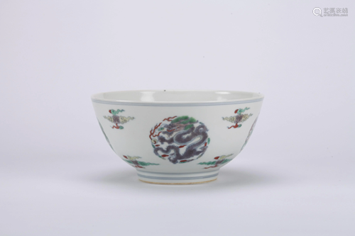 A CHINESE DOUCAI 'DRAGON' BOWL, KANGXI M…