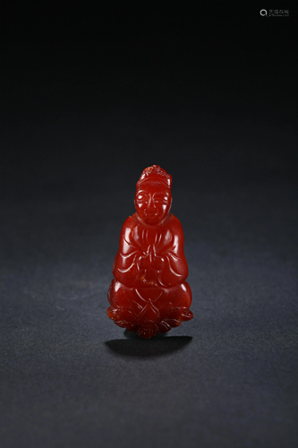 A CHINESE CARVED AMBER PENDANT, MING DY…