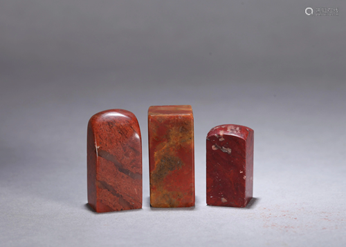 A GROUP OF THREE CHINESE SOAPSTONE SEALS,…