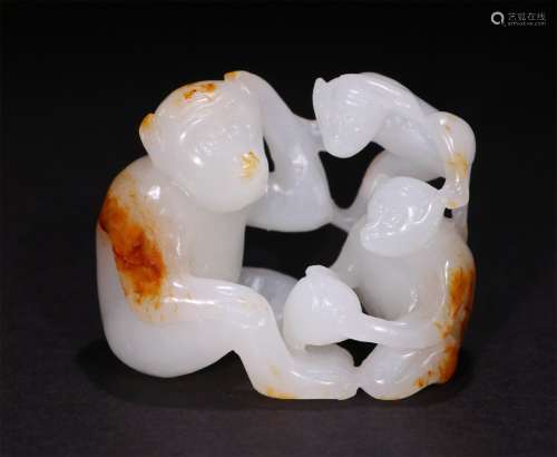 A CHINESE HETIAN JADE CARVING