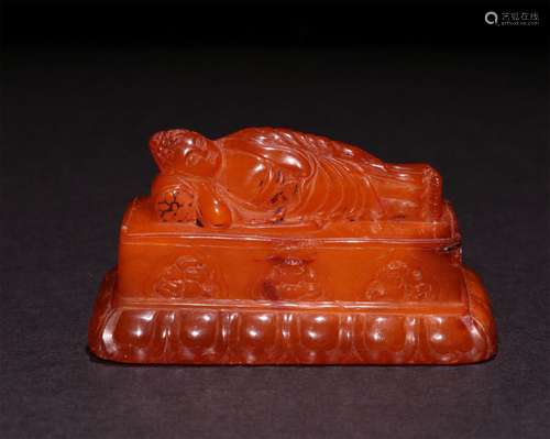 A CHINESE BEEWAX SLEEPING BUDDHA