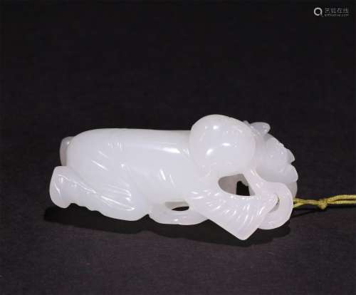 A CHINESE HETIAN JADE CARVING