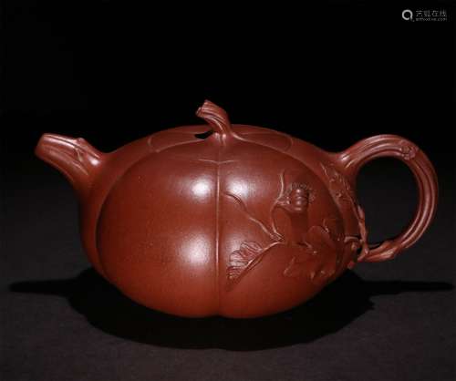 A CHINESE CLAY TEAPOT