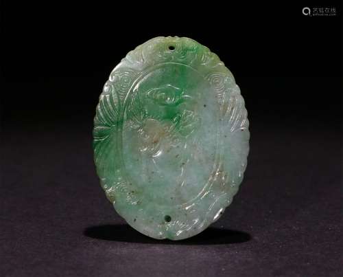 A CHINESE GREEN JADE PENDANT