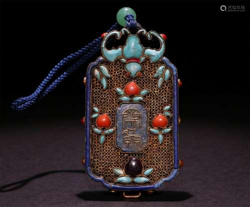 A CHINESE SILVER GILT PENDANT