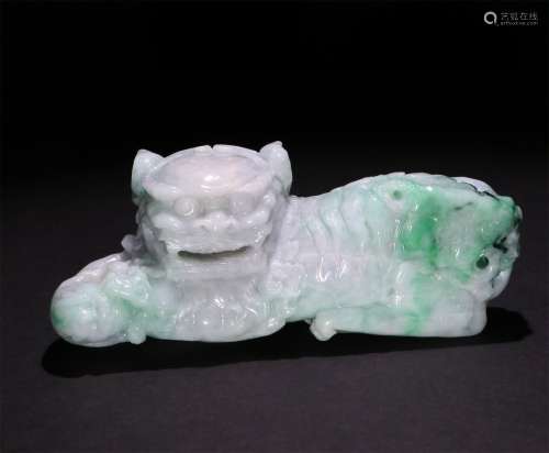 A CHINESE GREEN JADE ORNAMENT