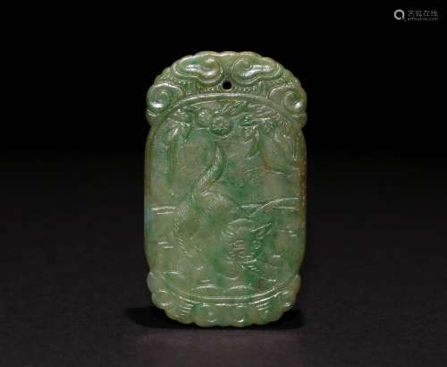A CHINESE GREEN JADE PENDANT