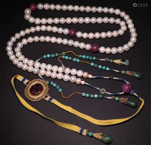 A STRING OF CHINESE PEARL COURT BEADS