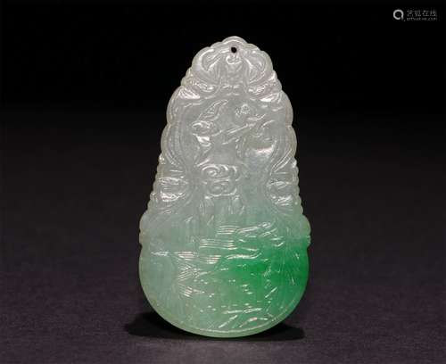 A CHINESE GREEN JADE PENDANT