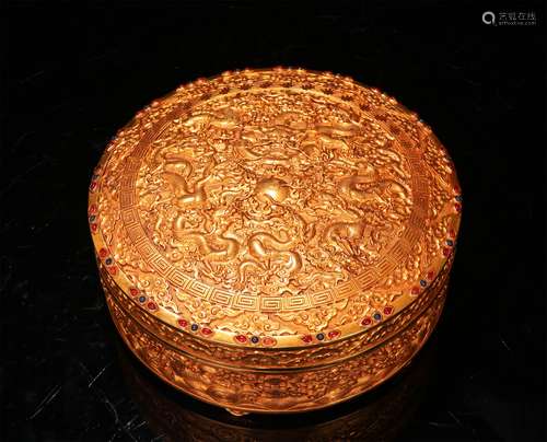 A CHINESE BRONZE GILDING NINE DRAGONS BOX