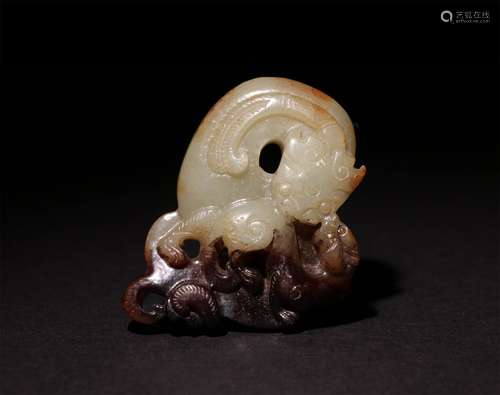 A CHINESE HETIAN JADE CARVING