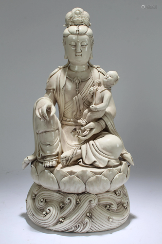 An Estate Chinese Joyful-kid De Blac Porcelain Guanyin