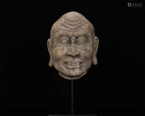 A CHINESE STONE ARHAT'S HEAD