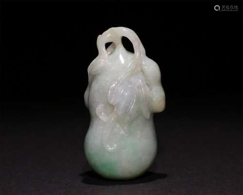 A CHINESE GREEN JADE GOURD