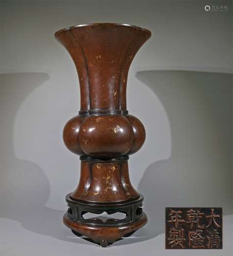 A QING DYNASTY GOLD FLOWER GU WITH COPPER BODY