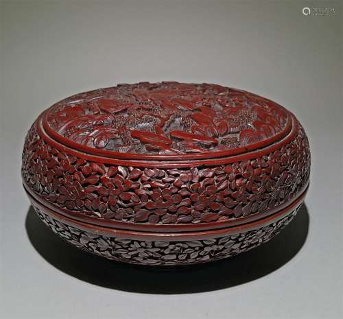A QING DYNASTY QIANLONG CARVED LACQUER BOX