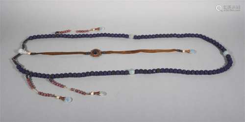 A STRING OF QING DYNASTY PEARLS WRAPPED WITH LAPIS LAZULI COURT BEADS