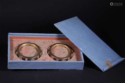 A PAIR OF QING DYNASTY AGILAWOOD BRACELETS INLAID WITH LONGEVITY