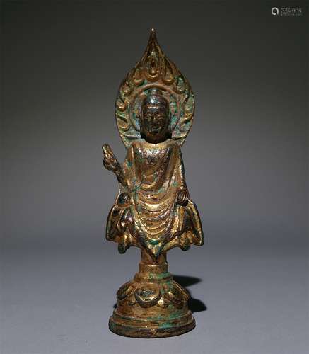 A BEIWEI DYNASTY BRONZE GILDED BUDDHA