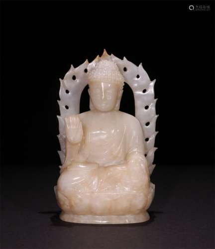 A QING DYNASTY HETIAN JADE VAIROCANA BUDDHA