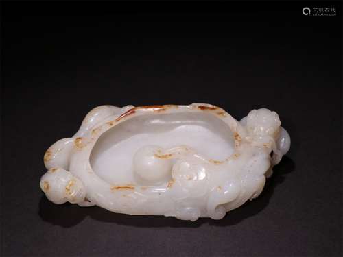 A QING DYNASTY HETIAN JADE BRUSH WASH DOUBLE DRAGONS PLAYING WITH BEADS