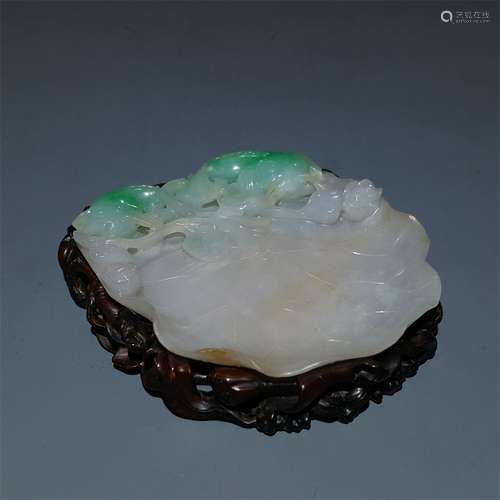 A QING DYNASTY CARVED JADEITE LOTUS LEAF SHAPE BRUSH LICK