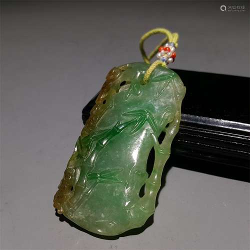 A QING DYNASTY CARVED JADEITE PENDANT