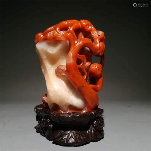 A QING DYNASTY CARVED SOUTH RED AGATE BRUSH HOLDER