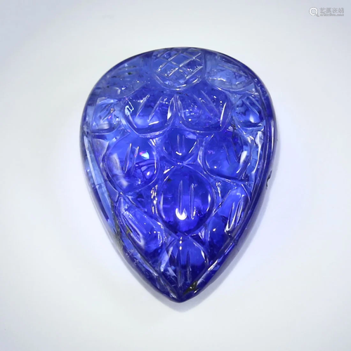 IGI Certified 27.36 ct. Tanzanite Pear Carving TANZ…