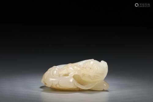 A Chinese Hetian Jade Carved Lion Ornament