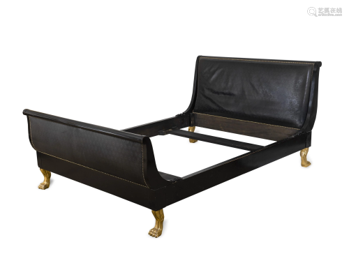 An Empire Style Ebonized and Gilt Wood Sleig…