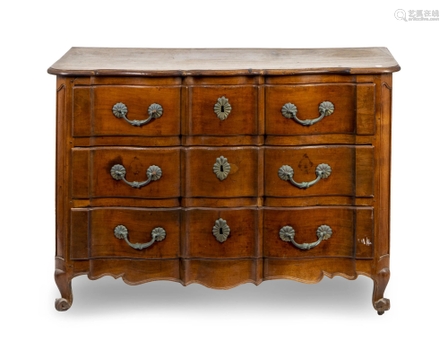 A Louis XV Provincial Style Serpentine-Fronted Walnut