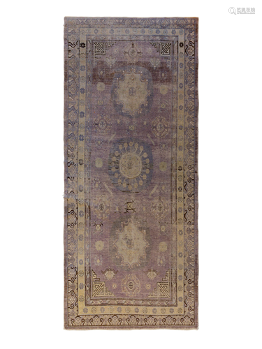 A Khotan Wool Rug 13 feet 9 inches 5 feet x 7 inches.