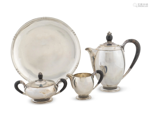 A Danish Silver Three-Piece Tea Set and a Fina Circ…