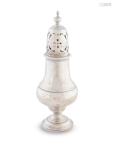 An English Silver Muffineer Height 8 1/2 inches.