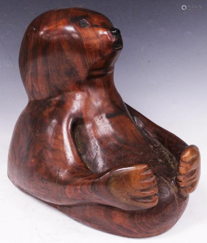 VINTAGE CARVED SCULPTURE OF OTTER