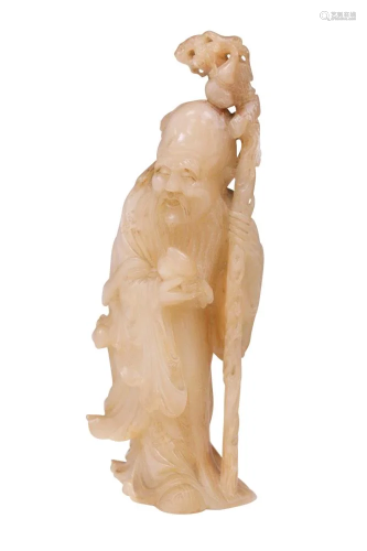 EARLY CHINESE CARVED WHITE JADE FIGURE