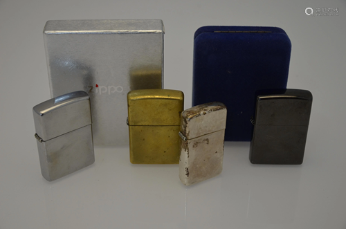 Four various Zippo cigarette lighters