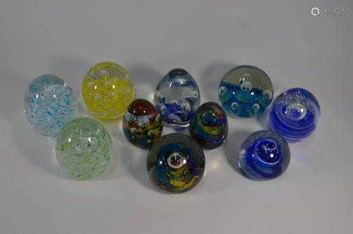 Eight various abstract design bubble paperweights