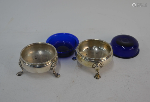 Four Georgian silver salts and spoons