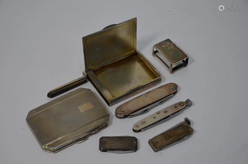 A silver cigarette case and other silver smoking