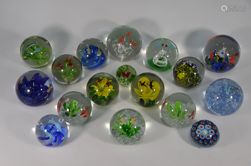 A selection of thirteen glass 'Aquarium' paperweights