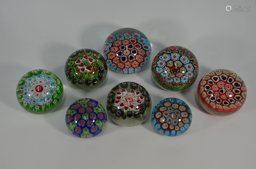 Eight various millefiori cane paperweights