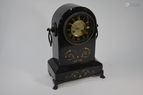 A late 19th century slate mantel clock, the gilt