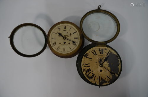 Two brass bulkhead clocks