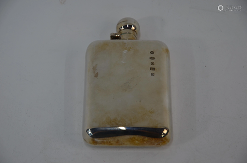 A modern silver hip flask