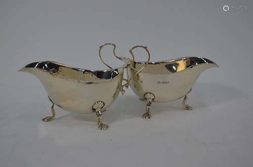 Three silver sauce boats