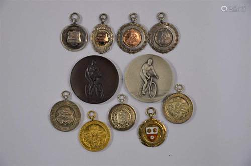 A collection of various silver and silver-gilt cycling