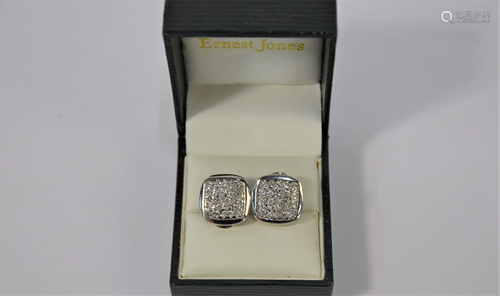 A pair of square pave set earrings